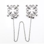 Prensas para pezones con cadena sens